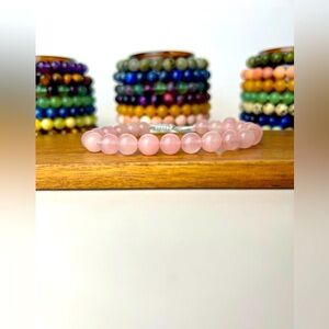Handmade gemstone bracelet. This Rose Quartz braided bracelet is adjustable.